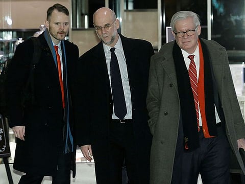US trade delegation member Under Secretary of Commerce for International Trade Gilbert B. Kaplan (R) arrives at a hotel after talks with Chinese officials in Beijing, China, February 11, 2019.   