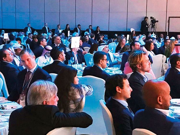 Delegates at the Milken Institute Summit on Tuesday