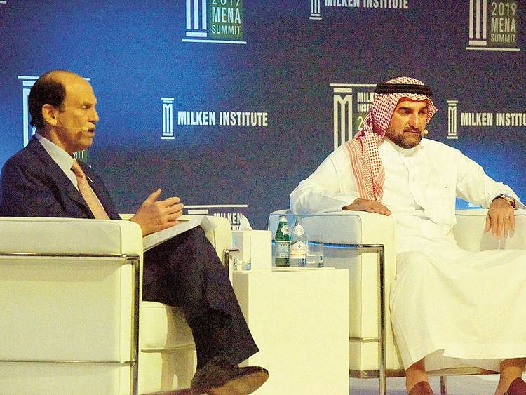 Al Rumayyan (right) with Michael Milken