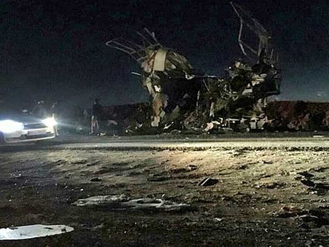 A handout picture released by the Iranian news agency Fars News on February 13, 2019, shows a bus that was reportedly blown up by a suicide attack in southeastern Iran on February 13, 2019.  