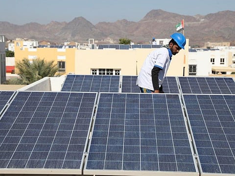 Solar panels installed on the roofs of villas in Hatta.