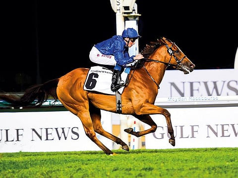 Poetic Charm, ridden by jockey William Buick, winning Balanchine at Meydan Racecourse. 