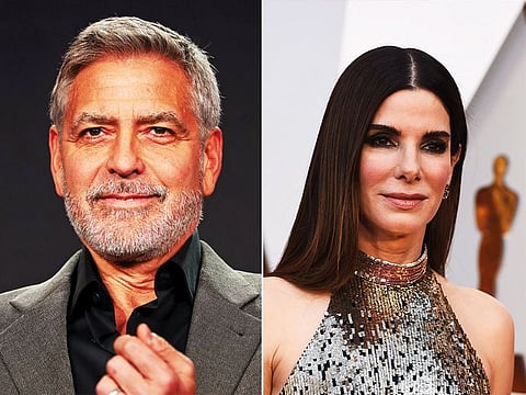 George Clooney, left, and Sandra Bullock.