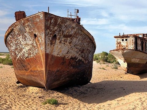 Boats in desert around Moynaq.