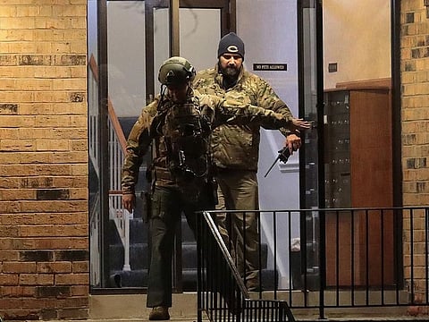 Police search the home of Gary Martin, a 45-year-old man who was killed by police after he opened fire at the Henry Pratt Company on February 15, 2019 in Aurora, Illinois. 