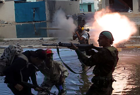 File picture shows fighting near Sirte. The GNA forces have been gathering personnel for weeks near the city.