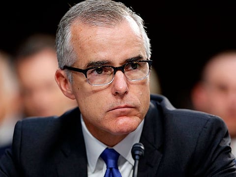  In this June 7, 2017, file photo, then-FBI acting director Andrew McCabe listens during a Senate Intelligence Committee hearing about the Foreign Intelligence Surveillance Act, on Capitol Hill in Washington. 