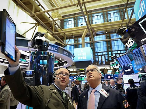 It's all pointing up... stock markets are are not feeling the chill from the virus outbreak any more. File picture of traders at the New York Stock Exchange (NYSE).