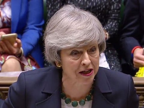 A video grab from footage broadcast by the UK Parliament's Parliamentary Recording Unit (PRU) shows Britain's Prime Minister Theresa May as she speaks during the weekly Prime Minister's Questions (PMQs) in the House of Commons in London on February 13, 2019.