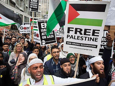 Demonstrators shout during a protest against Israel's air strikes in Gaza, in London July 11, 2014.