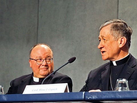 Cardinal Blase J. Cupich, Chicago Archbishop (right), and Mons. Charles Scicluna, Malta Archbishop at a conference at the Vatican.