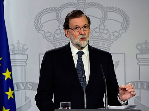 In this file photo taken on October 01, 2017 Spanish Prime Minister Mariano Rajoy speaks during a press conference at La Moncloa palace in Madrid, following a referendum on independence for Catalonia banned by Madrid.