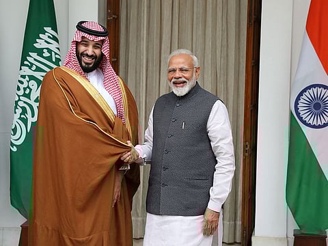 Mohammed Bin Salman, Saudi Arabia's crown prince, left, shakes hands with Narendra Modi, India's prime minister, at Hyderabad House in New Delhi, India, on Wednesday, Feb. 20, 2019. 