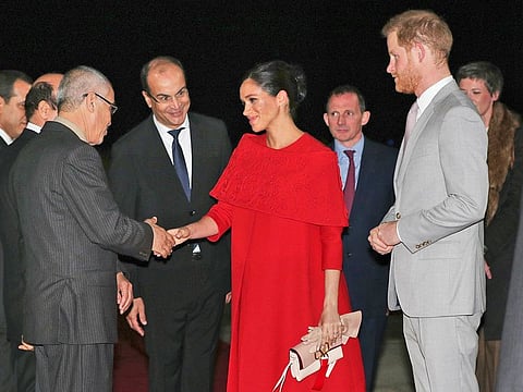 Britain's Prince Harry and Meghan Duchess of Sussex, are welcomed by officials and dignitaries at the Casablanca Airport in Casablanca
