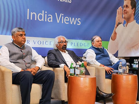 Congress leaders Sam Pitroda, Himanshu Vyas and Rajeev Gowda at the NRI outreach programme to take their inputs on election manifesto in Dubai on Saturday.