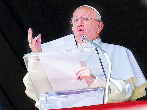 Pope Francis delivers his message from the window of the Apostolic palace as he arrives for the weekly Angelus prayer on February 24, 2019 at the Vatican.   
