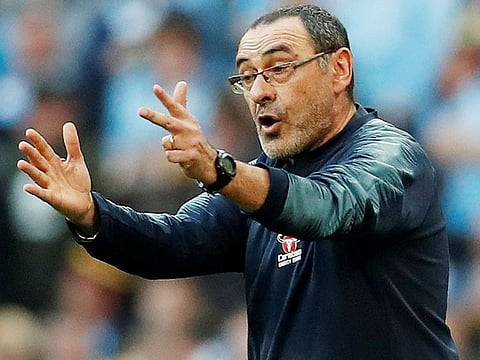 Chelsea's head coach Maurizio Sarri gestures from the touchline during the English League Cup final football match between Manchester City and Chelsea at Wembley stadium in north London on February 24, 2019. 