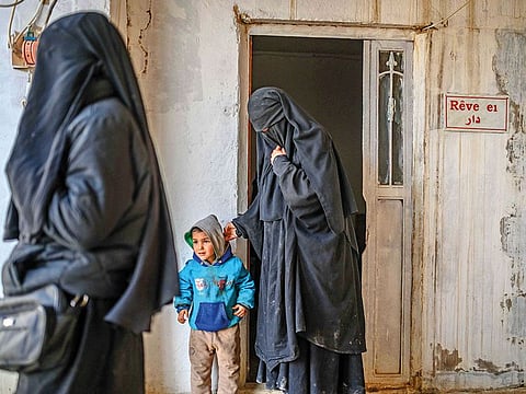 Two detained French women who fled the Daesh group’s last pocket in Syria at Al Hol camp in the Al Hasakeh governorate in northeastern Syria on February 17.
