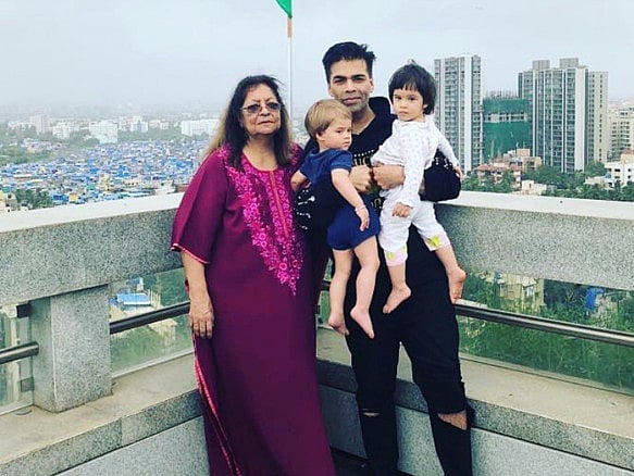 Karan-Johar-with-twins-Yash-and-Rooh-1551078629409