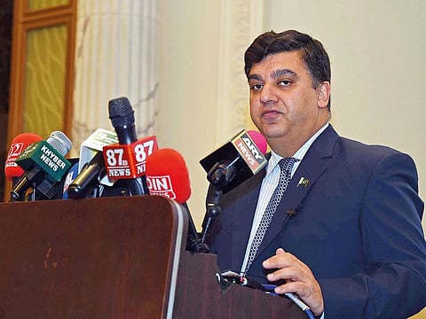 Ahmed Amjad Ali,Consul General of  Pakistan in Dubai giving his speech during the Interactive Session of Pakistani Community with Dubai Police at Habtoor Palace Dubai.