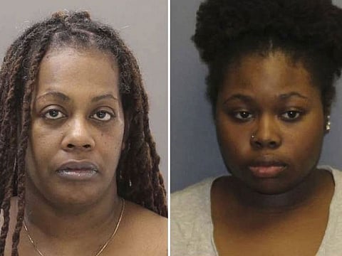 This Bucks County District Attorney's Office handout photo obtained February 26, 2019 shows suspects Shana Decree (L) and Dominique Decree who have been charged after five of their relatives were found dead in a Morrisville, Pennsylvania apartment