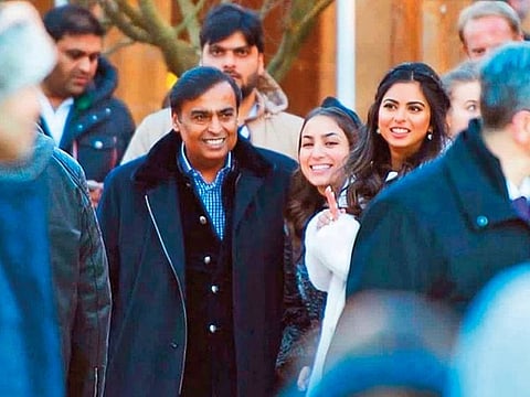 Mukesh Ambani (left) and Isha Ambani (right) at the pre-wedding celebrations in Switzerland