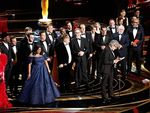 Peter Farrelly with the cast and crew of "Green Book" after being awarded best picture during the 91st annual Academy Awards at the Dolby Theater in Los Angeles, Feb. 24, 2019.