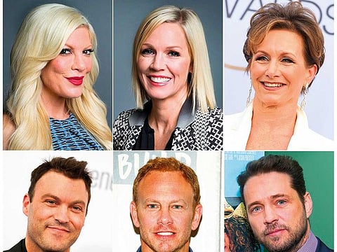 Cast members of ‘Beverly Hills 90210’ series, from top lef: Tori Spelling, Jennie Garth, Gabrielle Carteris, and bottom row from left, Brian Austin Green, Ian Ziering and Jason Priestley.