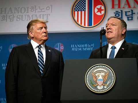 President Donald Trump looks on as Secretary of State Mike Pompeo speaks at a news conference after meeting with Kim Jong-un, North Korea's leader, in Hanoi, Vietnam, on Thursday, Feb. 28, 2019.