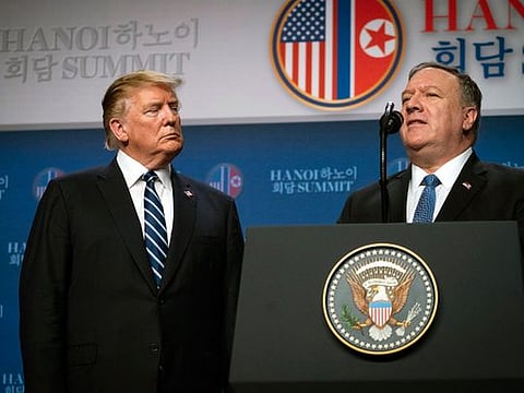 President Donald Trump looks on as Secretary of State Mike Pompeo speaks at a news conference after meeting with Kim Jong-un, North Korea's leader, in Hanoi, Vietnam, on Thursday, Feb. 28, 2019.