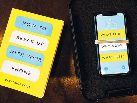 Catherine Price's "How To Break Up With Your Phone" the book that New York Times business columnist Kevin Roose turned to for advice, in Brooklyn.