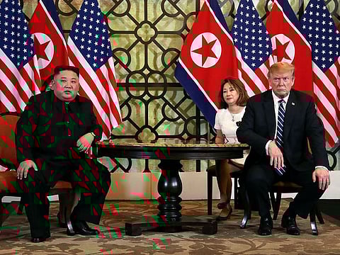 North Korean leader Kim Jong Un and U.S. President Donald Trump listen to questions from the media during their one-on-one bilateral meeting at the second North Korea-U.S. summit in the Metropole hotel in Hanoi, Vietnam February 28, 2019.