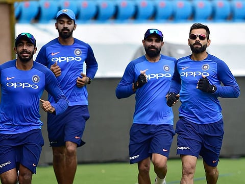 Skipper Virat Kohli with teammates during a practice session ahead of the first One Day International match against Australia at Rajiv Gandhi International Cricket Stadium in Hyderabad.