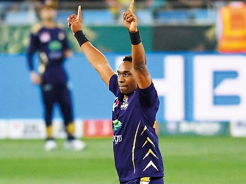 Dwayne Bravo celebrates a wicket in Dubai.
