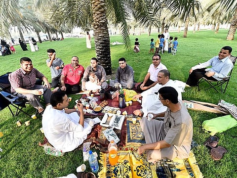 Resident celebrate with friends and family at the Buhairah corniche in Sharjah.