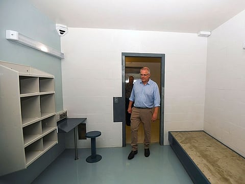 Australian Prime Minister Scott Morrison is seen inside a high care accommodation room as he tours North West Point Detention Centre on Christmas Island, Wednesday, March 6, 2019. 