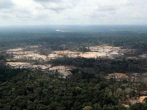 An aerial view shows a deforested area of the Amazon jungle in southeast Peru caused by illegal mining, during a Peruvian military operation to destroy illegal machinery and equipment used by wildcat miners in Madre de Dios, Peru.