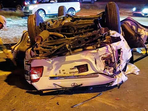 The wreckage of the crash that killed four youths in Ras Al Khaimah.