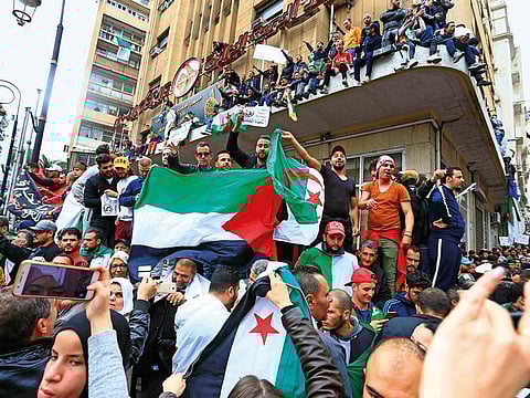 The powerful military is girding against eventual chaos, while the citizens in the streets across the North African nation are relishing the notion of an Algeria reborn, no longer shackled by the murky system.