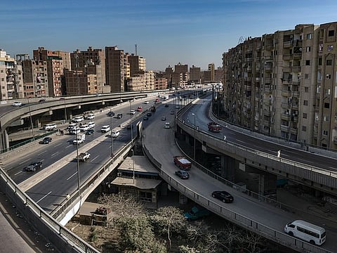 Apartment buildings line the Ring Road, a freeway that loops around Cairo