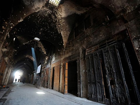 This file picture shows the damaged inflicted on the Old Aleppo markets in the old quarter of Syria's second city of Aleppo. Restoration works began on November 1, 2019.