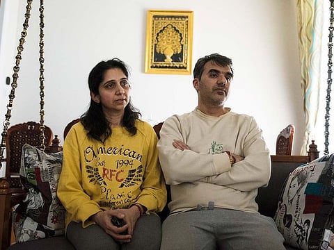 Manant Vaidya is joined by his wife Hiral, left, as he speaks to a Canadian Press reporter about losing his two parents, sister, brother-in-law, and two young nieces in the crash of an Ethiopian Airlines jetliner Sunday, at his home in Brampton, Ontario, Monday, March 11, 2019 