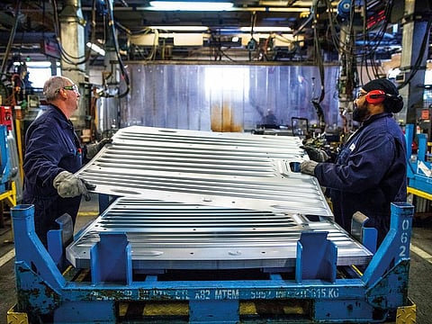 Employees at Vauxhall bodyshop in Luton, UK. Britain says it aims to offset a spike in prices that consumers would experience in a no-deal departure as a result of the falling pound and higher costs of imports.