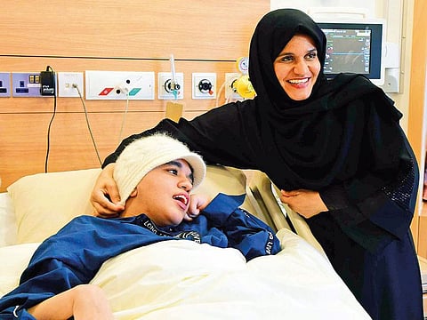 Shaikha Al Hammoudi, with her daughter Mariam, a 23-year-old Emirati national with cerebral palsy and hypothyroidism.