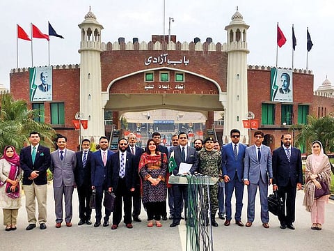 The Pakistan delegation at the Wagah border crossing before leaving for the Kartarpur Corridor talks.