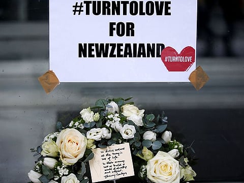A floral tribute with a card, placed by Britain's opposition Labour Party leader Jeremy Corbyn, is seen outside New Zealand House in London, Britain March 15, 2019.