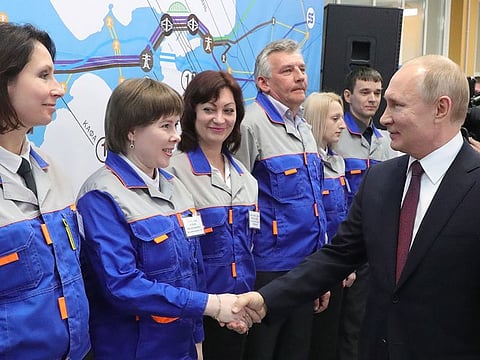 Russian President Vladimir Putin takes part in a ceremony to launch the two power plants in Crimea, Sevastopol, March 18, 2019.