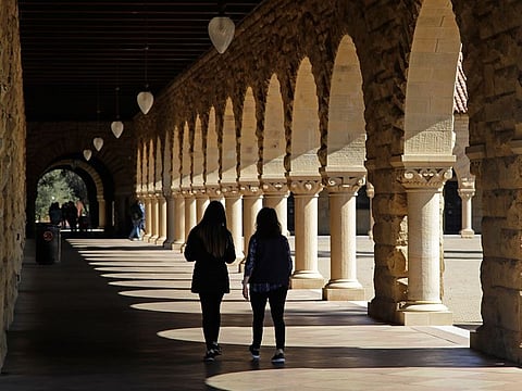 Students walk on the Stanford University campus, in Santa Clara, California.