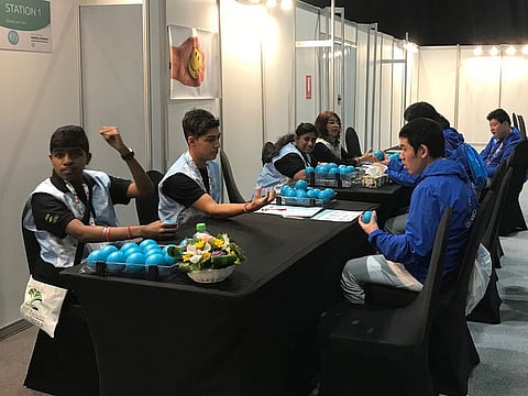 Binsal Abdul Kader/Gulf News Athletes get help at the ‘Strong Minds’ section of the Healthy Athletes programme at the Special Olympics.