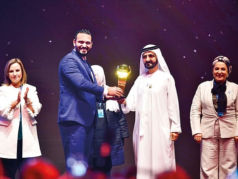 His Highness Shaikh Mohammad Bin Rashid Al Maktoum, Vice-President and Prime Minister of the UAE and Ruler of Dubai presenting Arab Hope Makers award to Mahmood Waheed from Egypt.